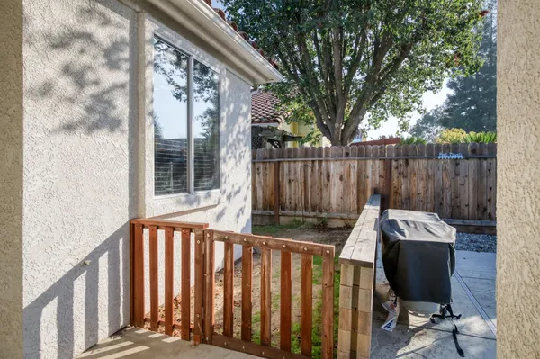 a view of a two chairs in the balcony