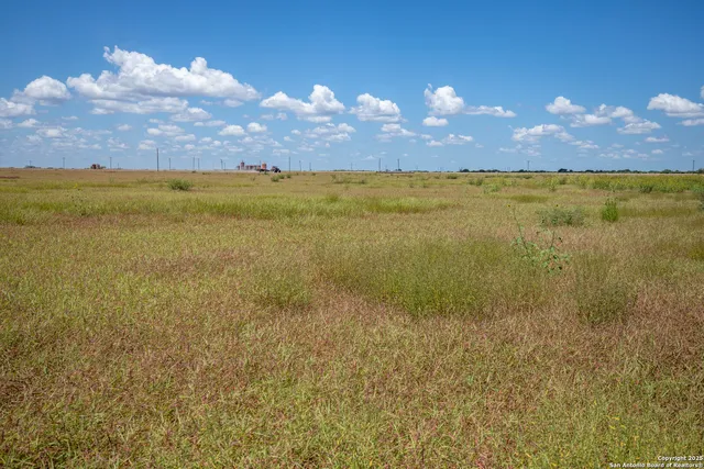 a view of a lake and sunset