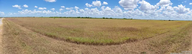 a view of a lake and sunset