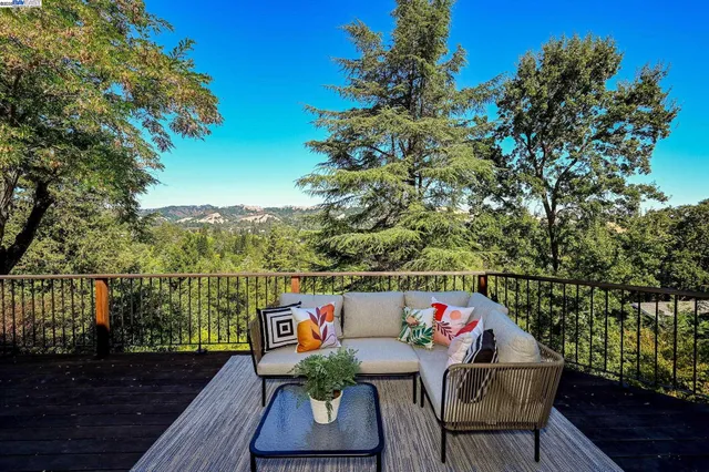 a view of city from terrace with seating space