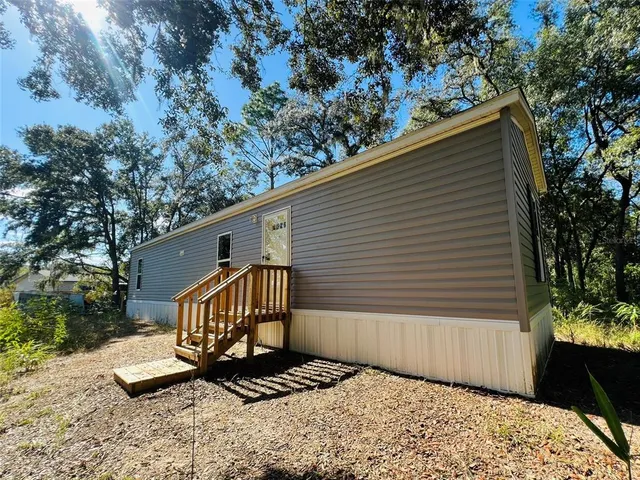 a view of a porch with a yard