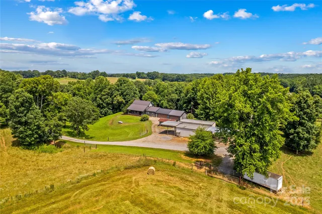 a view of a swimming pool with an outdoor space and seating area