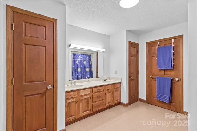 a view of a hallway with front door