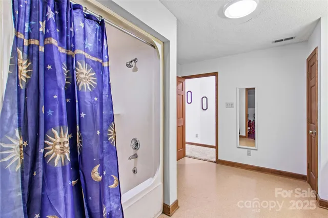 a view of a hallway with entryway