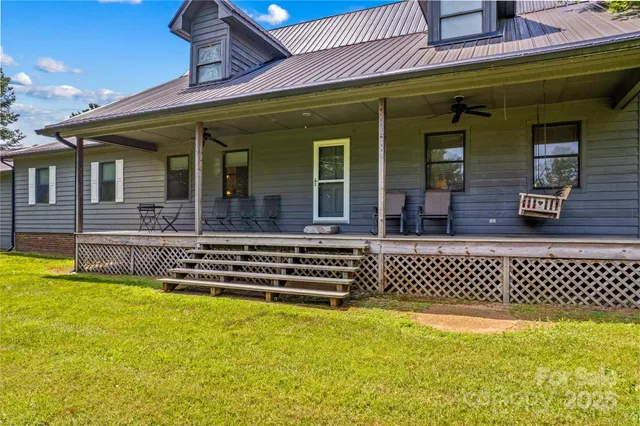 a view of a house with a swimming pool