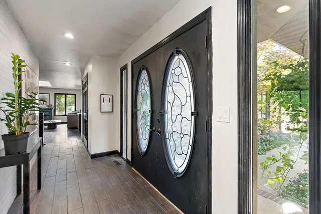 a view of living room with furniture and a window