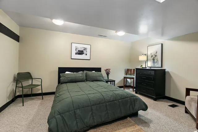 a view of a backyard with sitting area