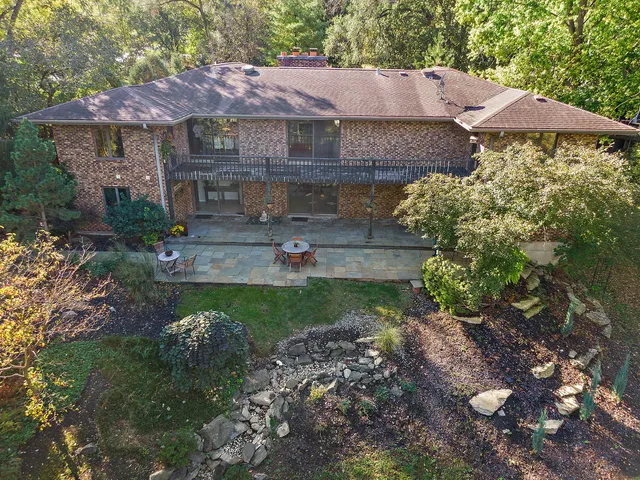 a view of a street next to a yard