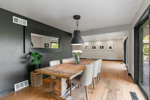 a open kitchen with a table and chairs in it