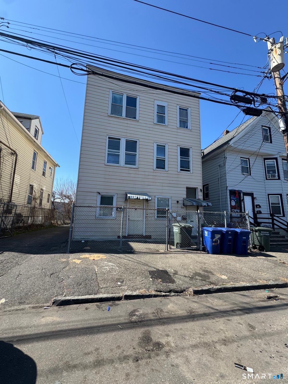 265 6th Street Bridgeport, CT 06607 - Photo 9 of 9 a view of a house with a patio