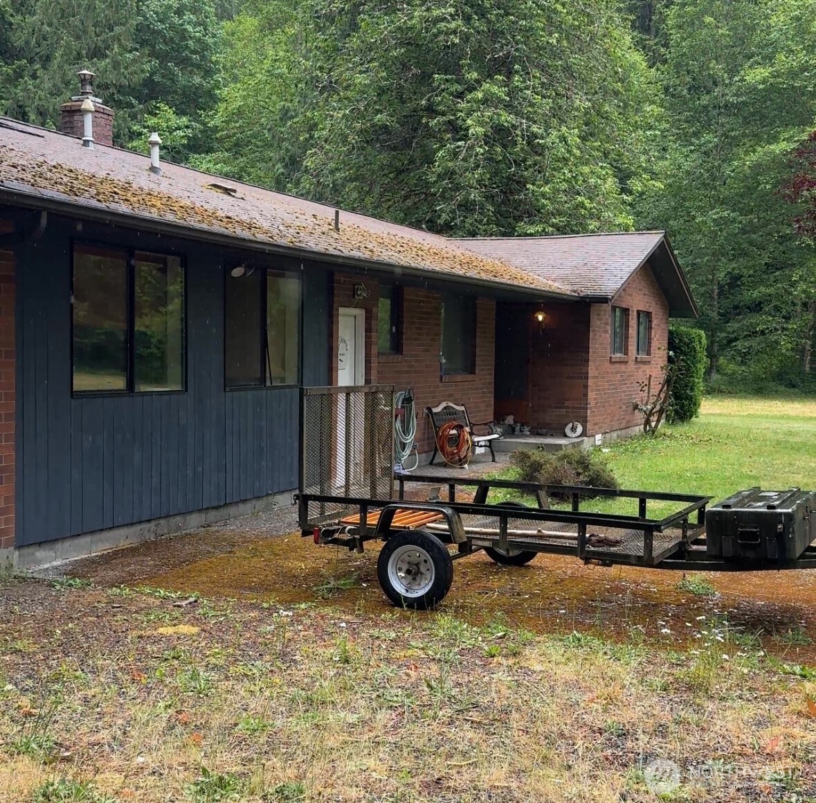 6180 Rutsatz Road Deming, WA 98244 - Photo 1 of 1 a house view with a garden space