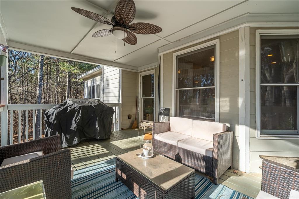 8935 Mountain Ridge Circle Ball Ground, GA 30107 - Photo 13 of 56 a living room with furniture