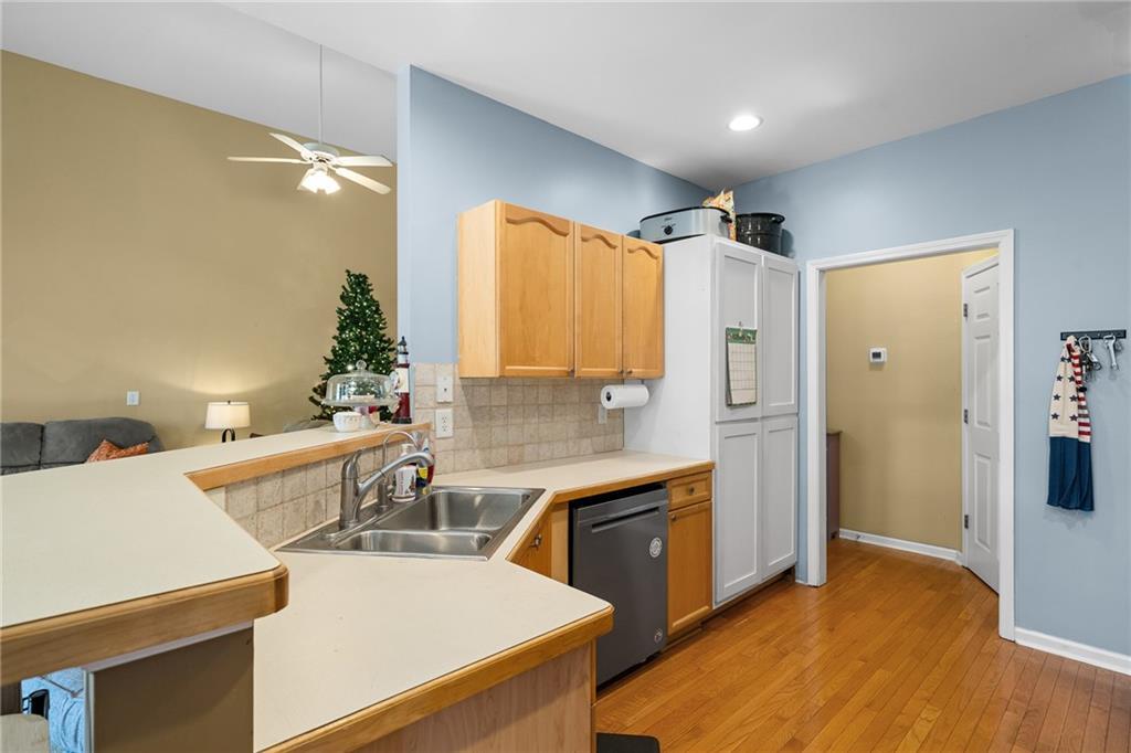 8935 Mountain Ridge Circle Ball Ground, GA 30107 - Photo 16 of 56 a view of a kitchen with cabinets and wooden floor