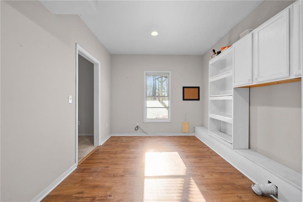 8935 Mountain Ridge Circle Ball Ground, GA 30107 - Photo 35 of 56 a view of an empty room with a window
