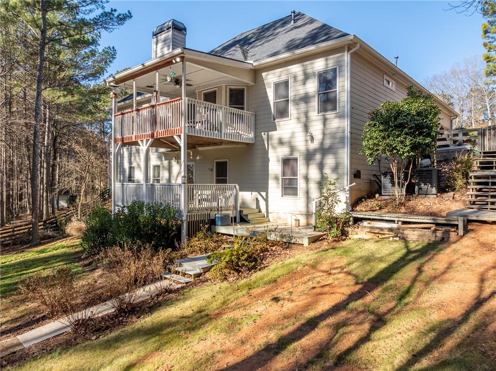 8935 Mountain Ridge Circle Ball Ground, GA 30107 - Photo 45 of 56 a view of swimming pool with outdoor seating