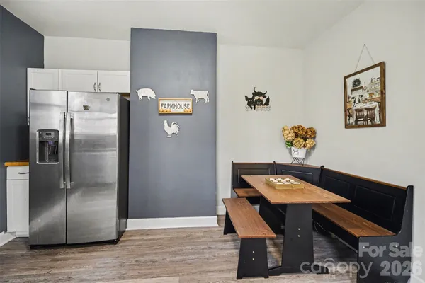 a room with a table and chairs