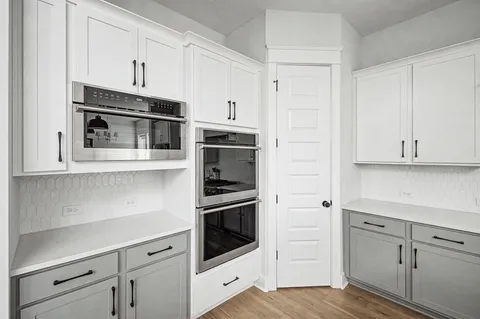 a bathroom with a bathtub and a sink