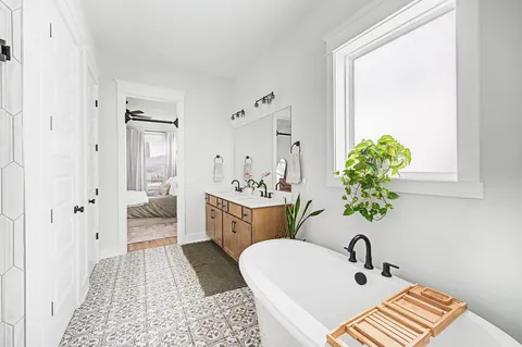 a bathroom with a bath tub