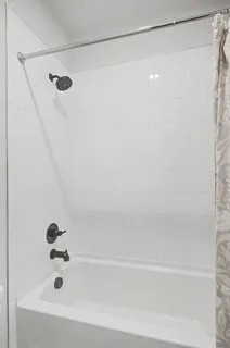 a view of a house with swimming pool and sitting area