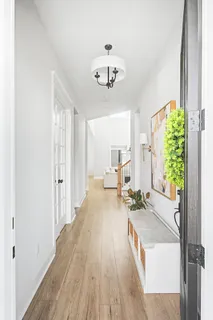 a view of a living room and a balcony