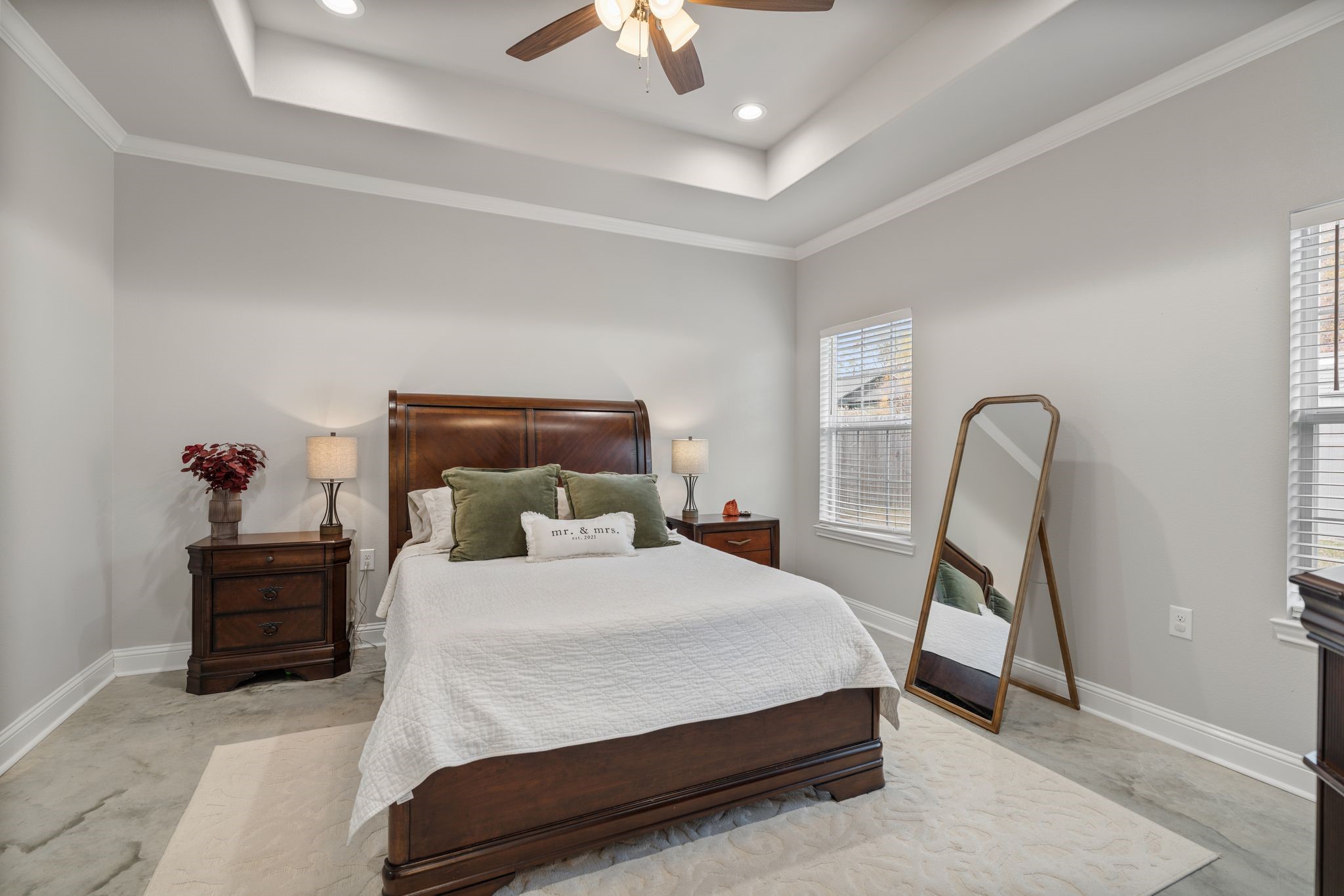 413 East Spruce Street Huntington, TX 75949 - Photo 18 of 37 a bedroom with a bed chair and a chandelier