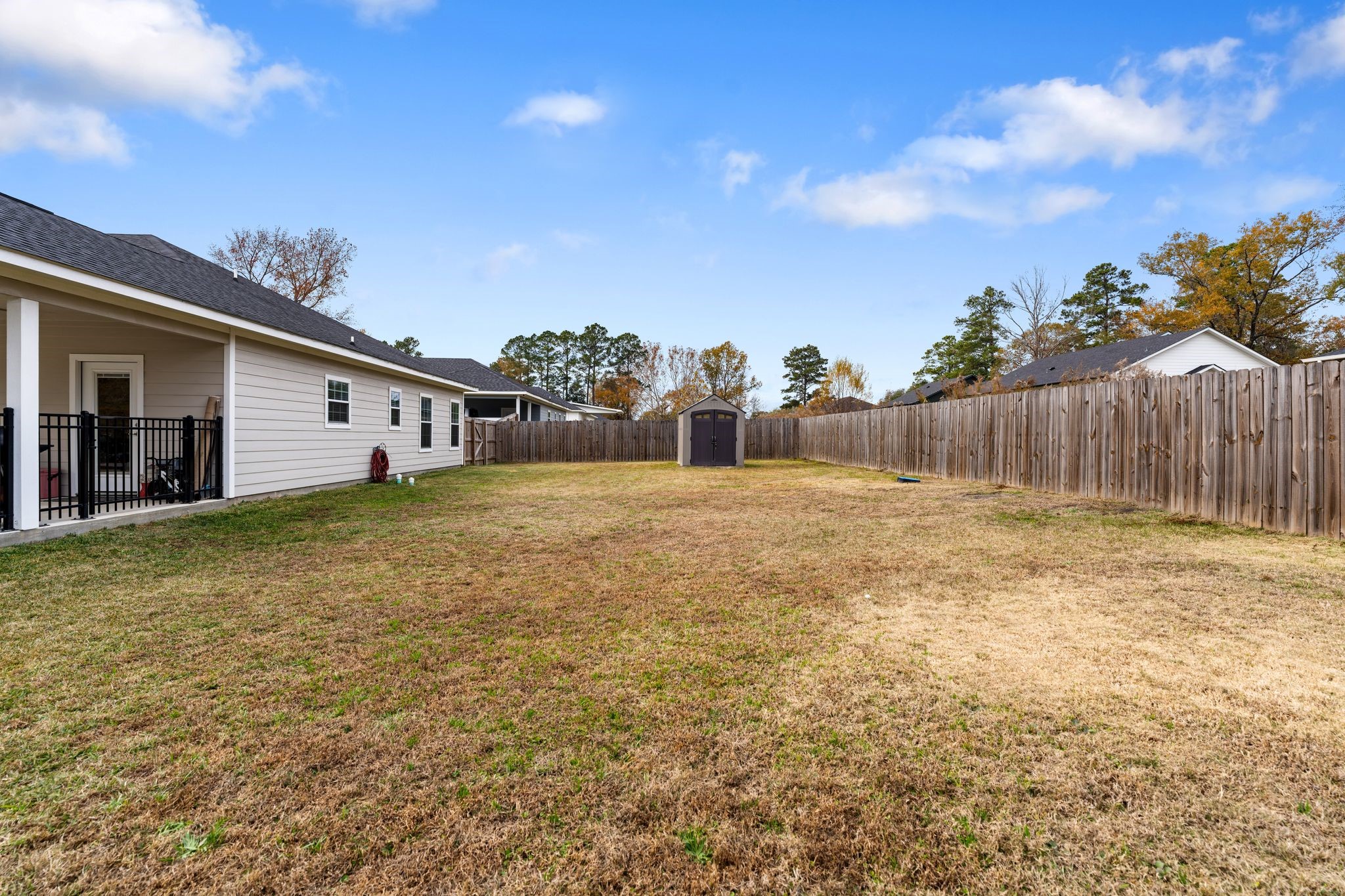 413 East Spruce Street Huntington, TX 75949 - Photo 27 of 37 a view of a house with a yard