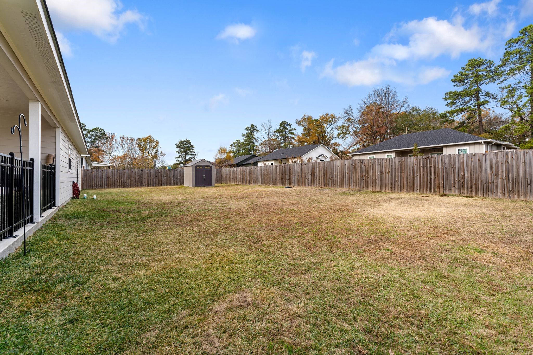 413 East Spruce Street Huntington, TX 75949 - Photo 28 of 37 a swimming pool with outdoor seating and yard