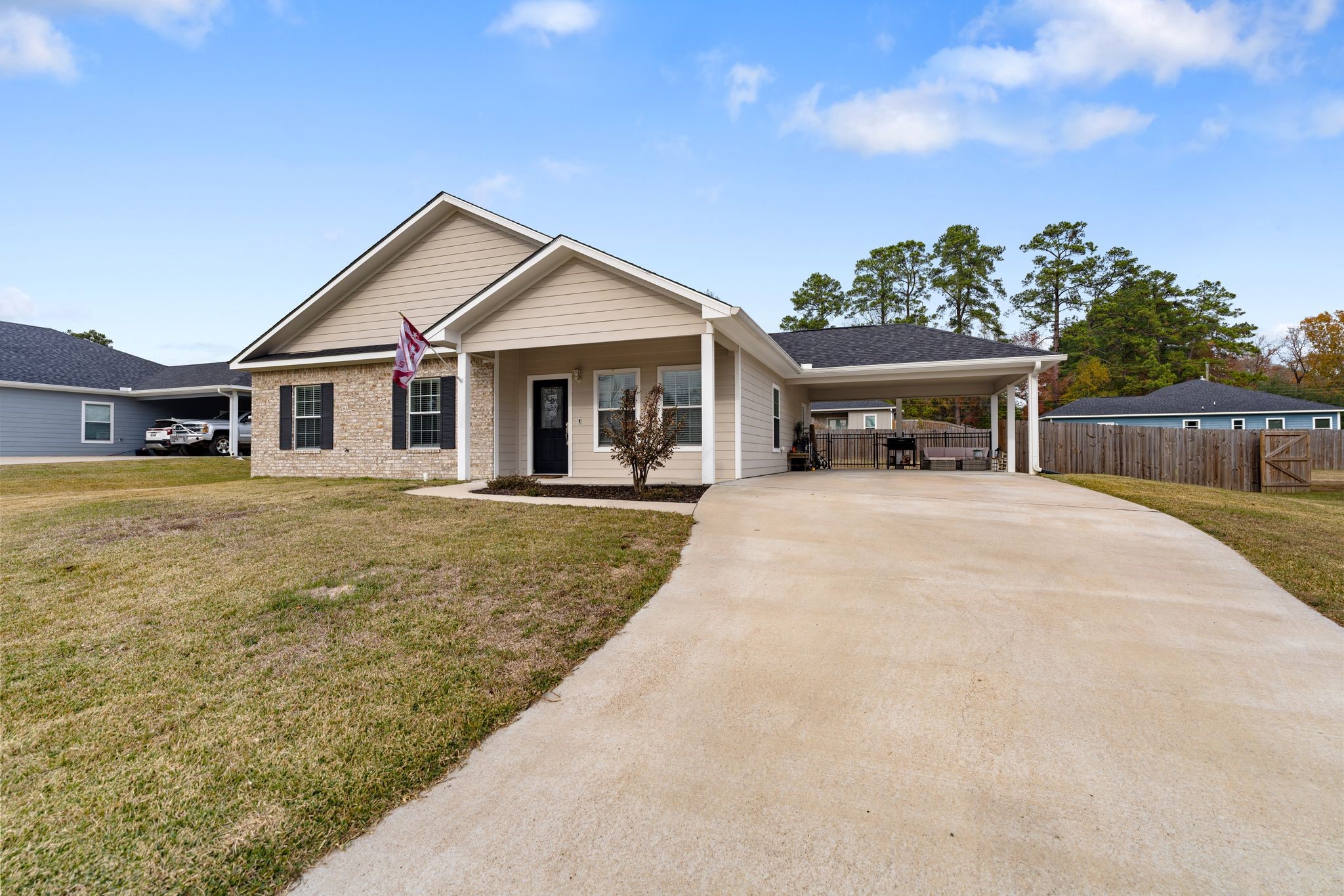 413 East Spruce Street Huntington, TX 75949 - Photo 35 of 37 a view of a house with a yard and sitting area
