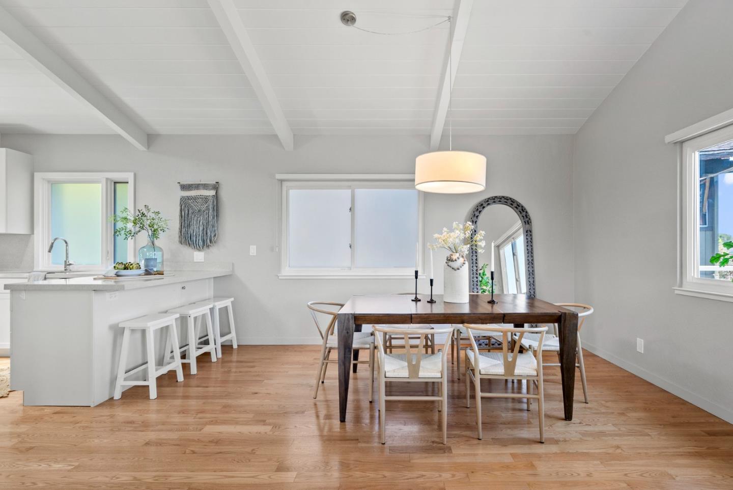 1975 Seascape Boulevard Aptos, CA 95003 - Photo 14 of 63 a dining room with furniture a chandelier and wooden floor