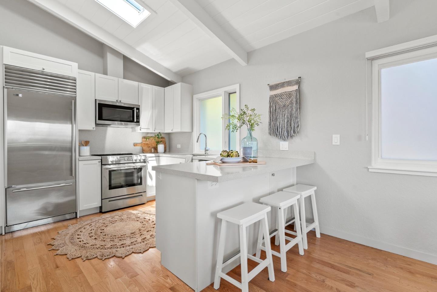 1975 Seascape Boulevard Aptos, CA 95003 - Photo 18 of 63 a kitchen with granite countertop a sink appliances cabinets and counter space