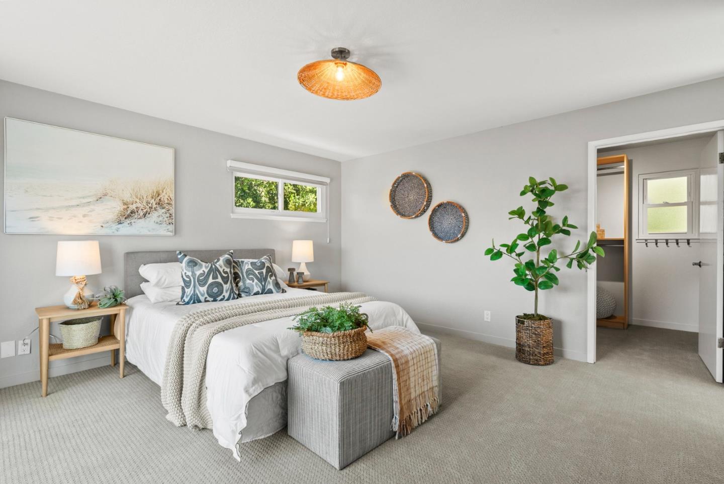 1975 Seascape Boulevard Aptos, CA 95003 - Photo 28 of 63 a bedroom with a bed and a potted plant