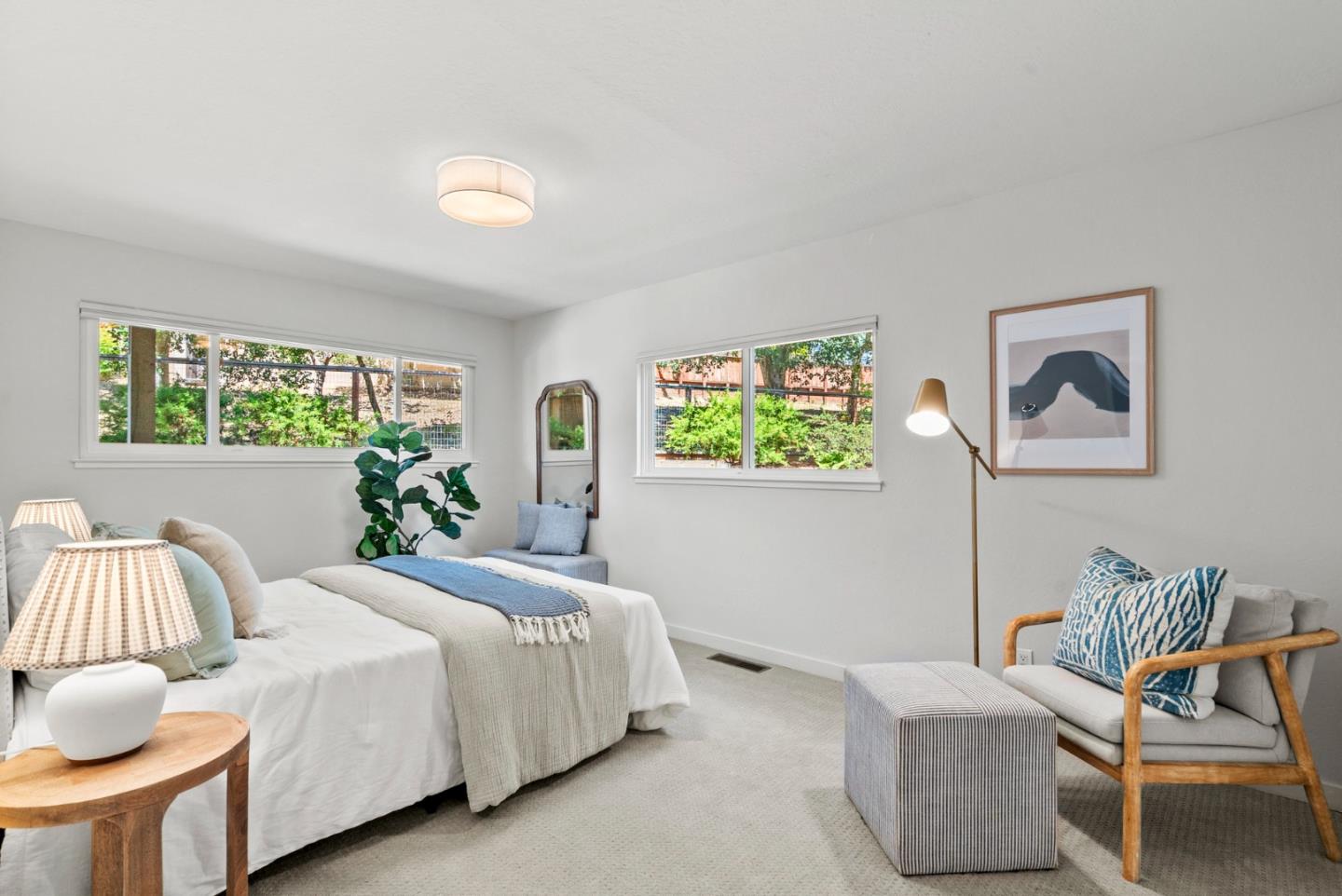 1975 Seascape Boulevard Aptos, CA 95003 - Photo 40 of 63 a bedroom with a bed and a couch