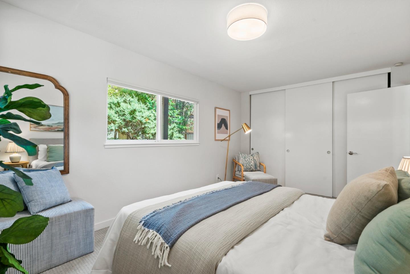 1975 Seascape Boulevard Aptos, CA 95003 - Photo 42 of 63 a bedroom with a bed and a window