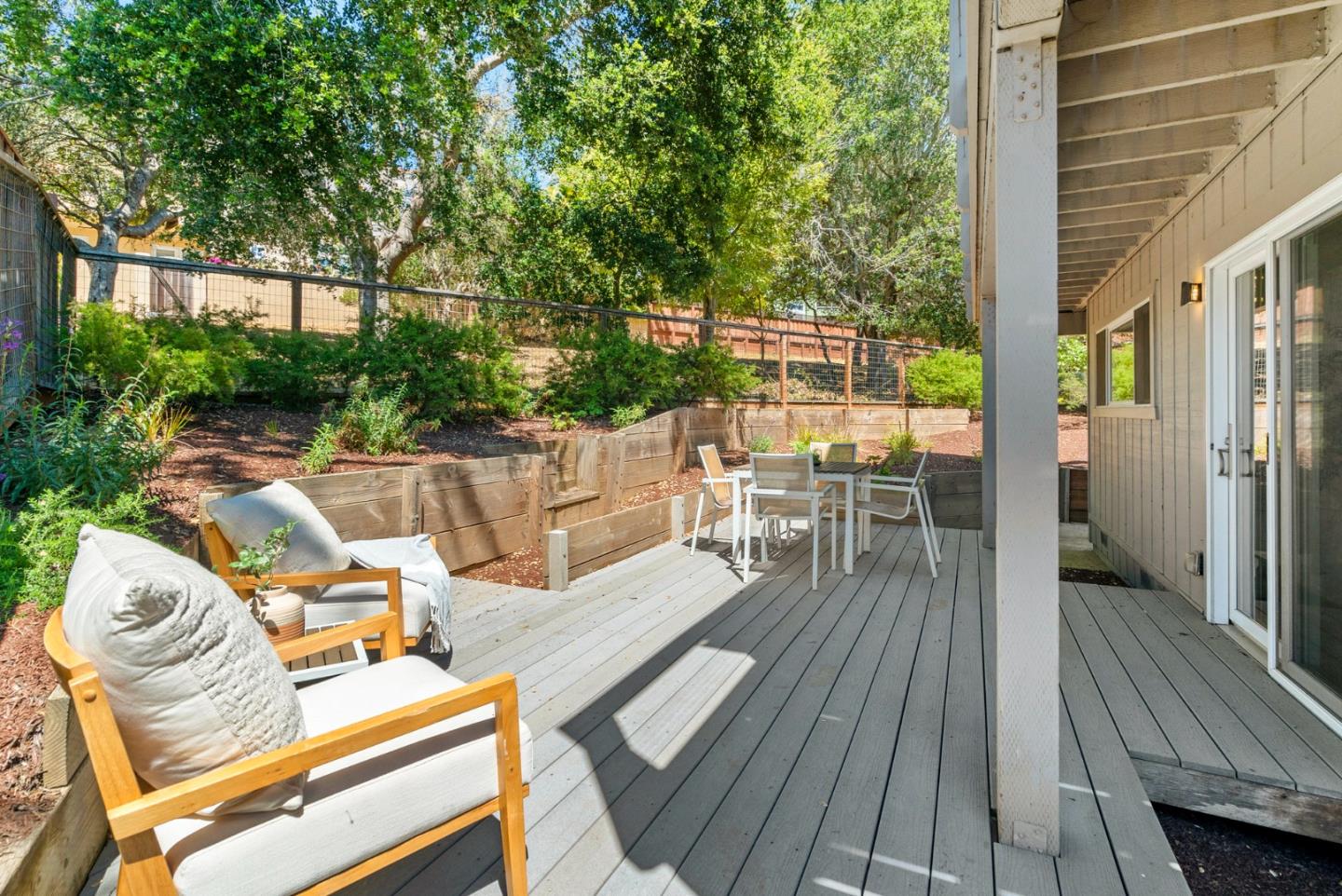 1975 Seascape Boulevard Aptos, CA 95003 - Photo 52 of 63 a view of a patio with table and chairs and wooden floor