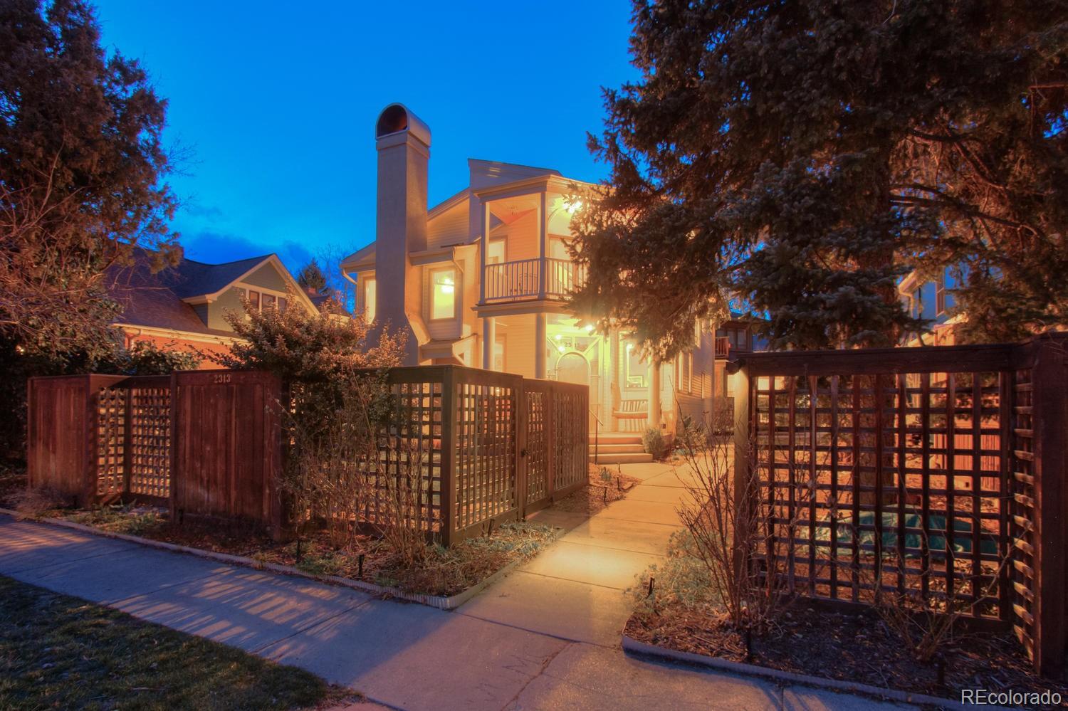 2313 Mapleton Avenue Boulder, CO 80304 - Photo 1 of 35 a view of a pathway with a wrought fence