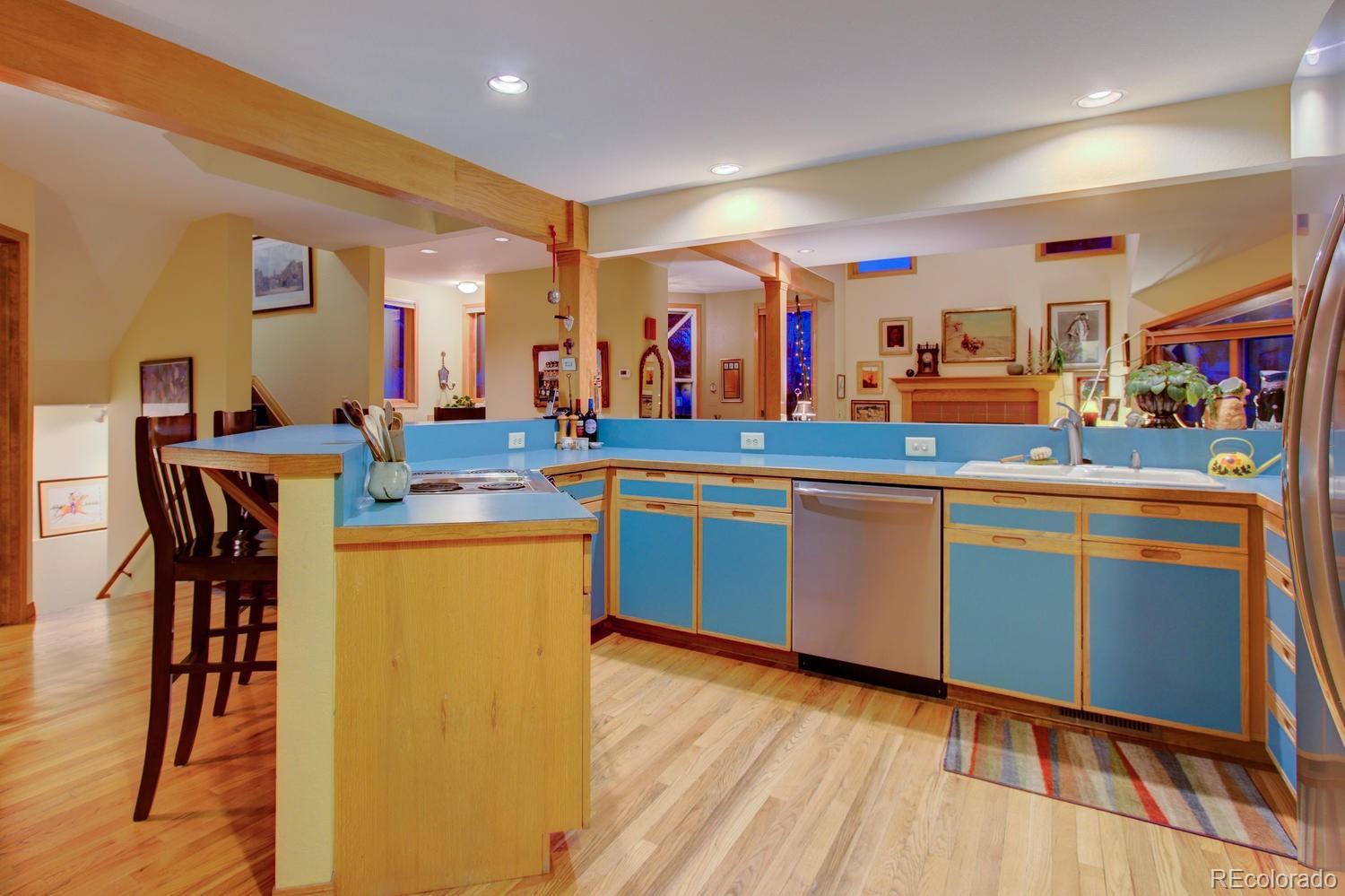 2313 Mapleton Avenue Boulder, CO 80304 - Photo 23 of 35 a kitchen with lots of counter top space and a sink