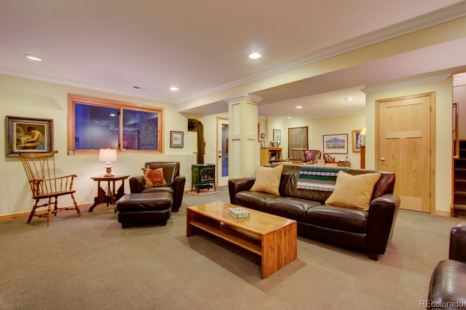 2313 Mapleton Avenue Boulder, CO 80304 - Photo 26 of 35 a living room with furniture and a large window