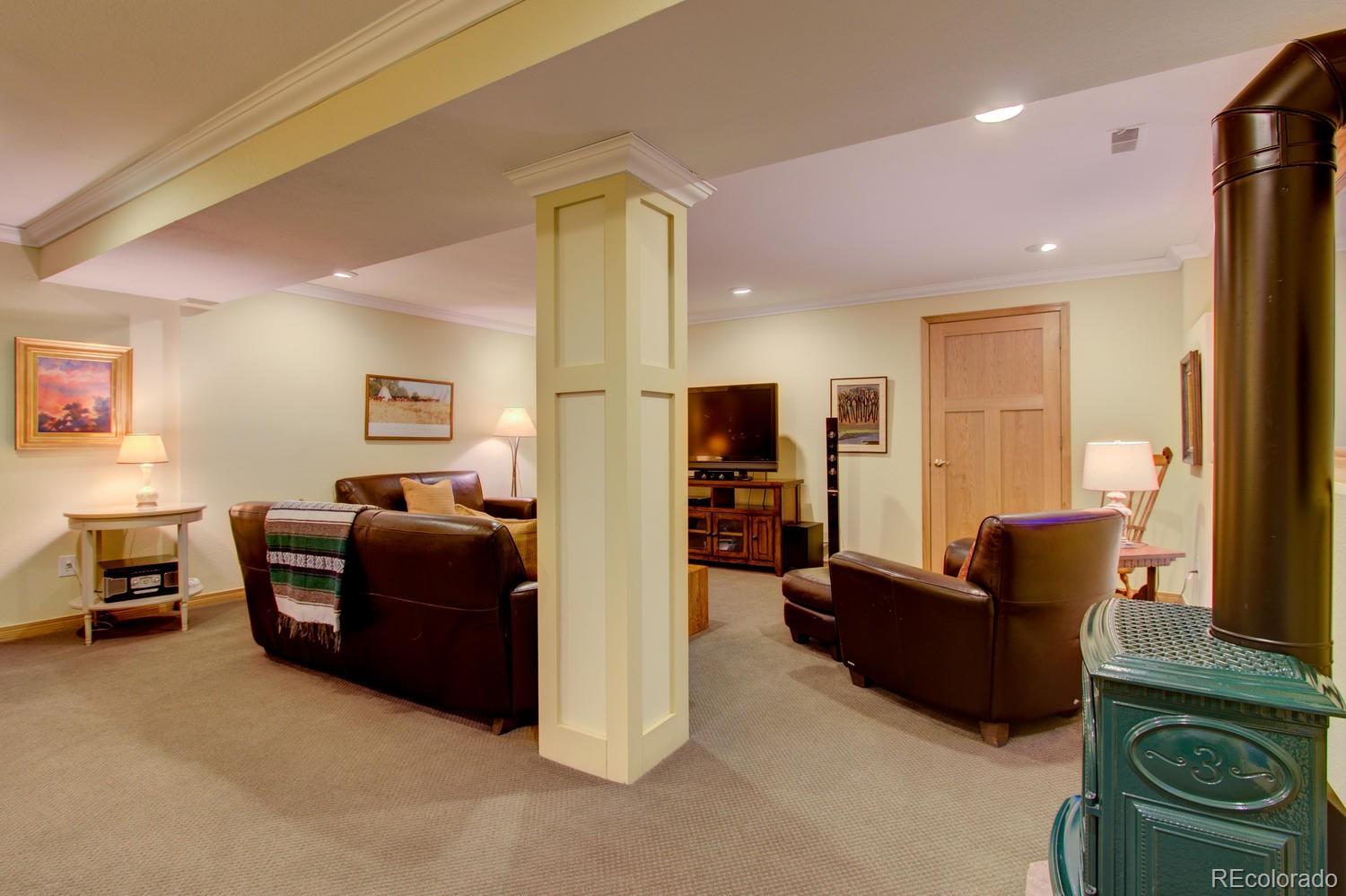 2313 Mapleton Avenue Boulder, CO 80304 - Photo 28 of 35 a living room with furniture and a window