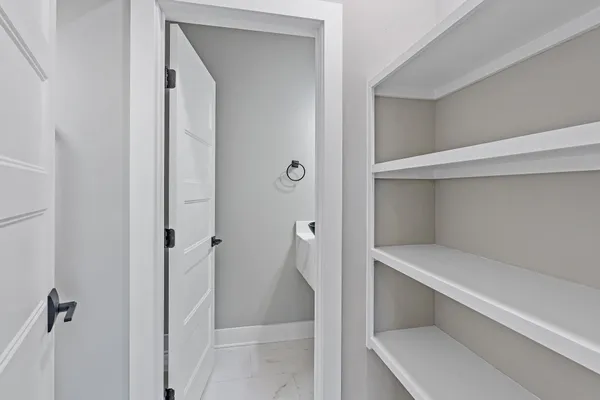 a view of an empty walk in closet
