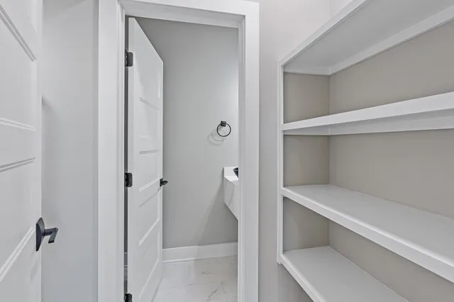 a view of an empty walk in closet