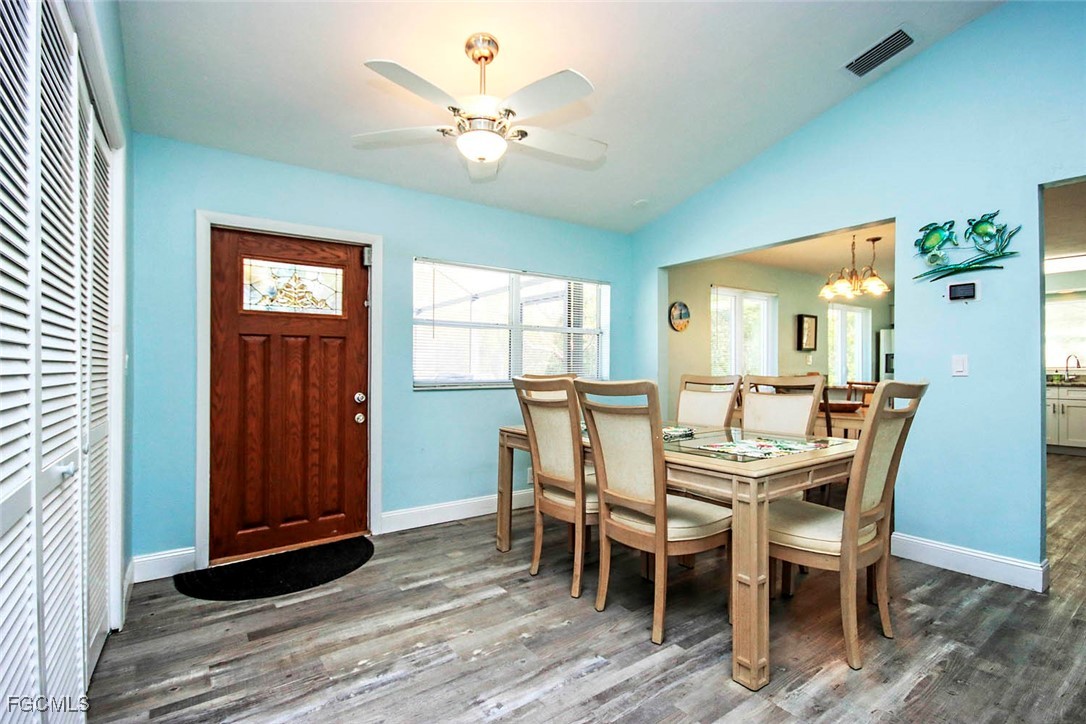 4560 Brainard Bayou Road Sanibel, FL 33957 - Photo 14 of 32 a dining room with furniture and window