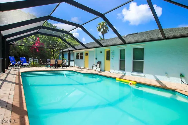 a view of an chairs and table in the patio