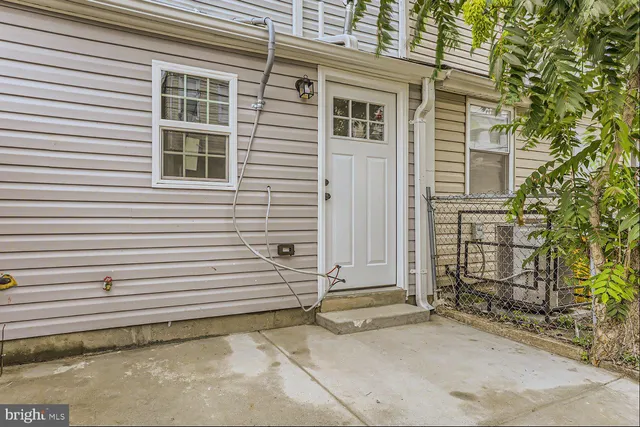 a view of a house with white door