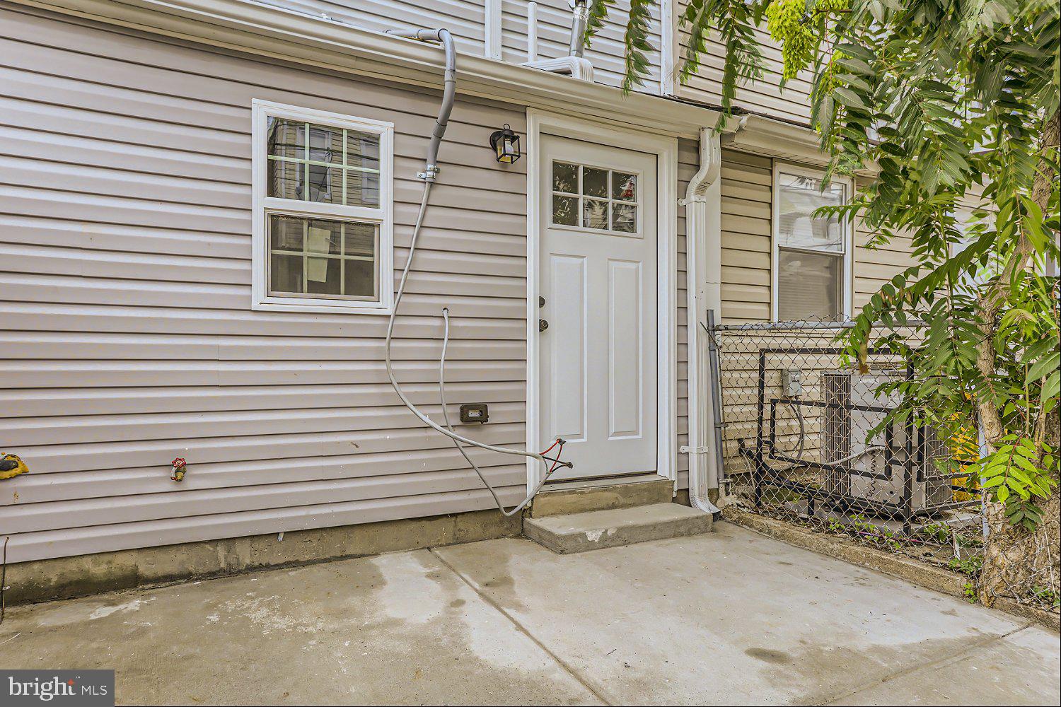 2829 Miles Avenue Baltimore, MD 21211 - Photo 22 of 25 a view of a house with white door