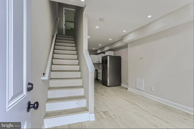 a view of entryway with wooden floor