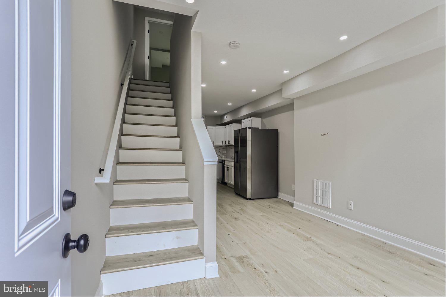 2829 Miles Avenue Baltimore, MD 21211 - Photo 4 of 25 a view of entryway with wooden floor