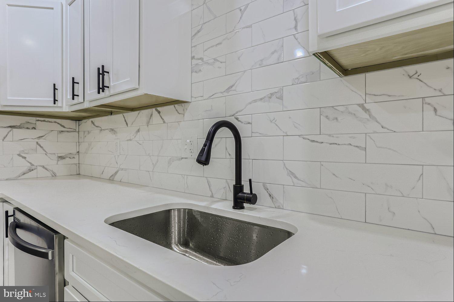 2829 Miles Avenue Baltimore, MD 21211 - Photo 10 of 25 a close view of sink and tap