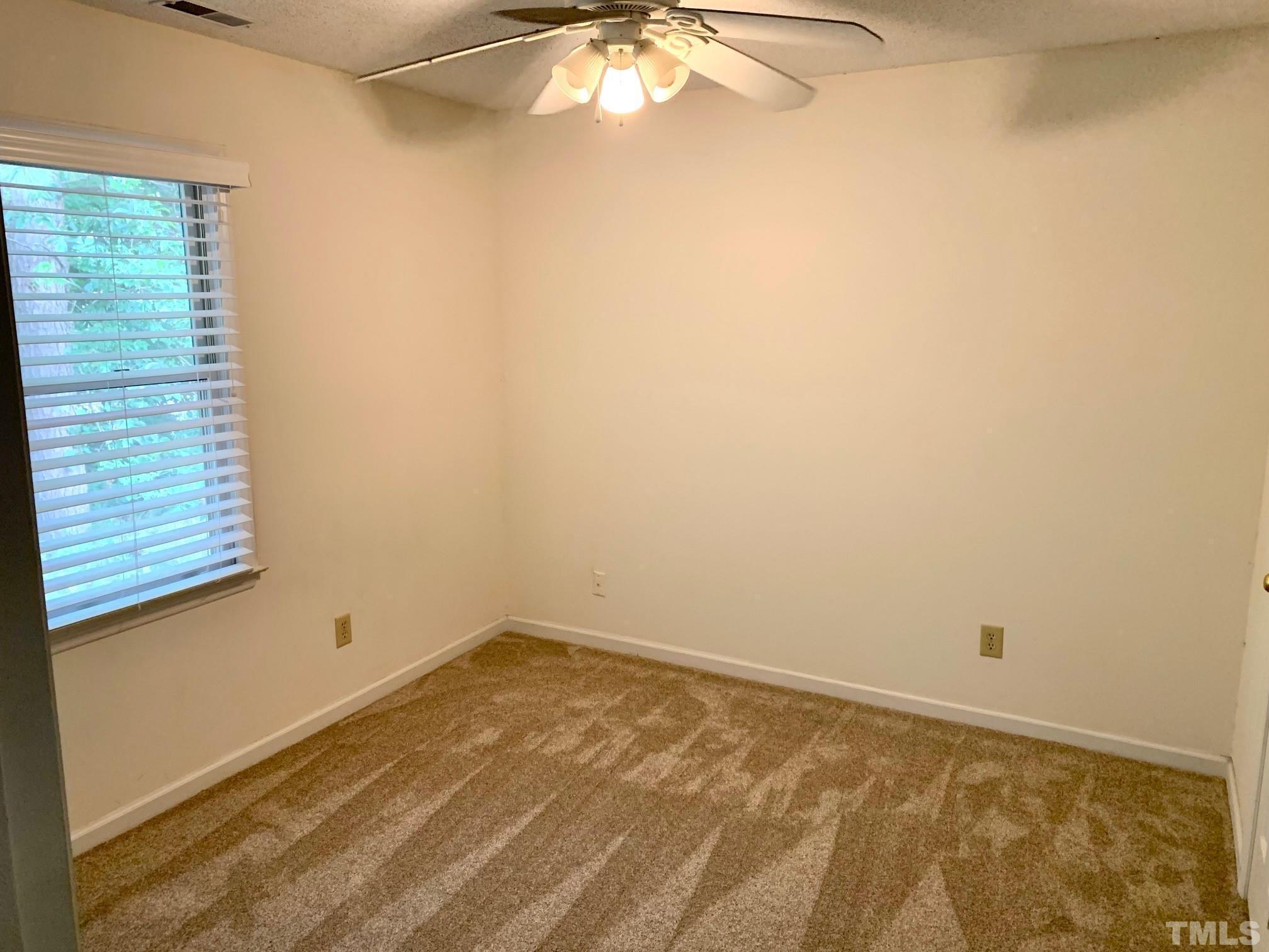 2240 Long And Winding Road Raleigh, NC 27603 - Photo 10 of 10 a view of a room that has a window in it