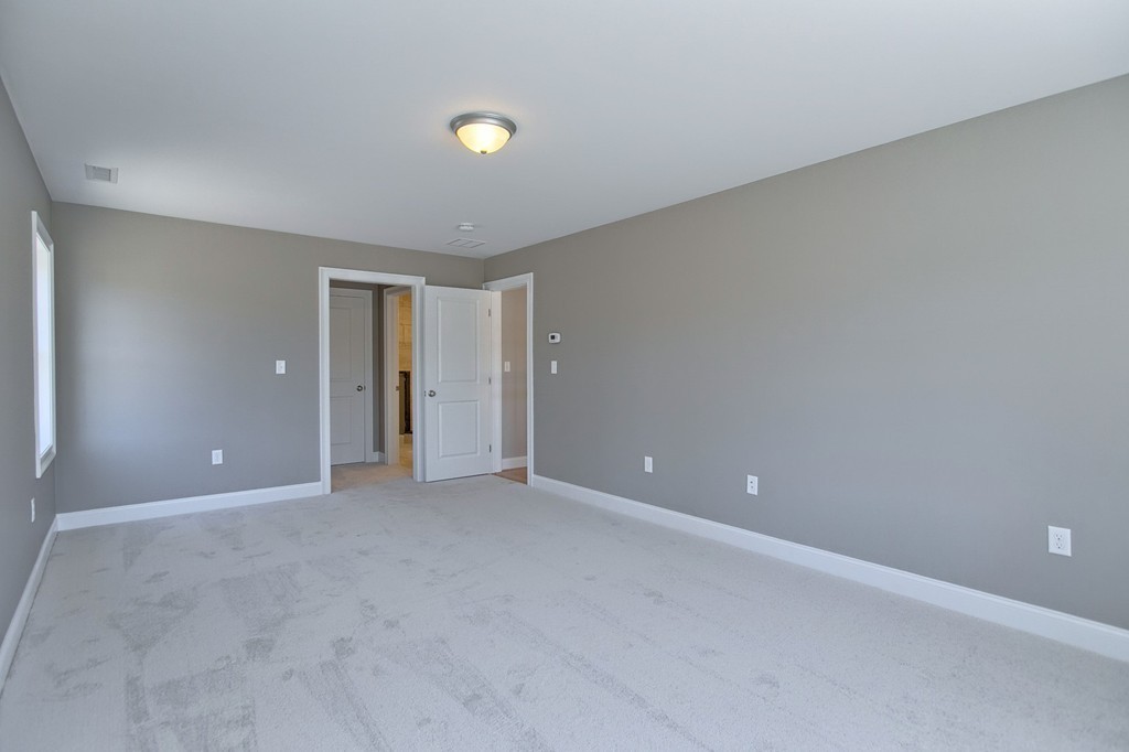 Lot 12 Grapevine Circle Georgetown, MA 01833 - Photo 14 of 27 a view of an empty room with window
