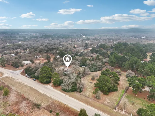 a view of a city street from a yard